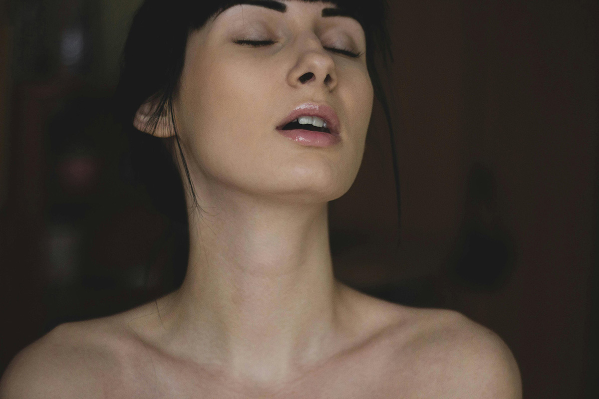 Woman is enjoying the pleasure with her eyes closed-Safewords